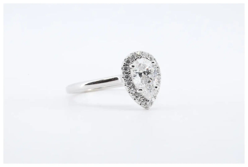 Contemporary 1.09ctw Pear Shaped Diamond Halo Engagement Ring