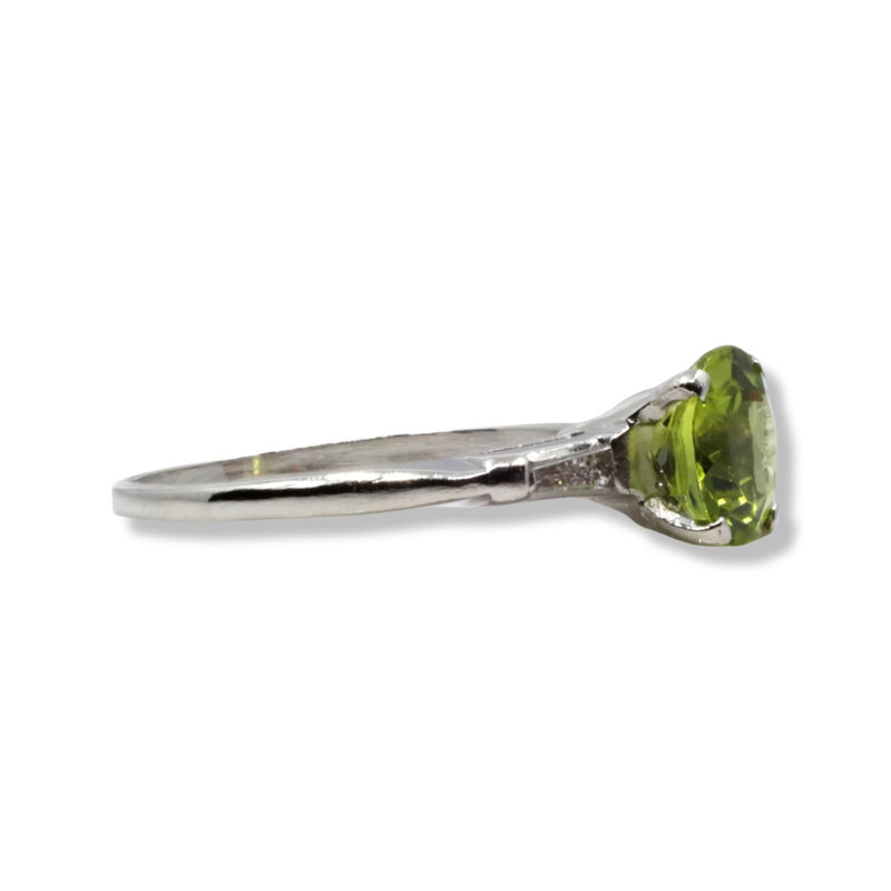 Eye Catching Peridot & Baguette Diamond Three Stone Ring in Platinum